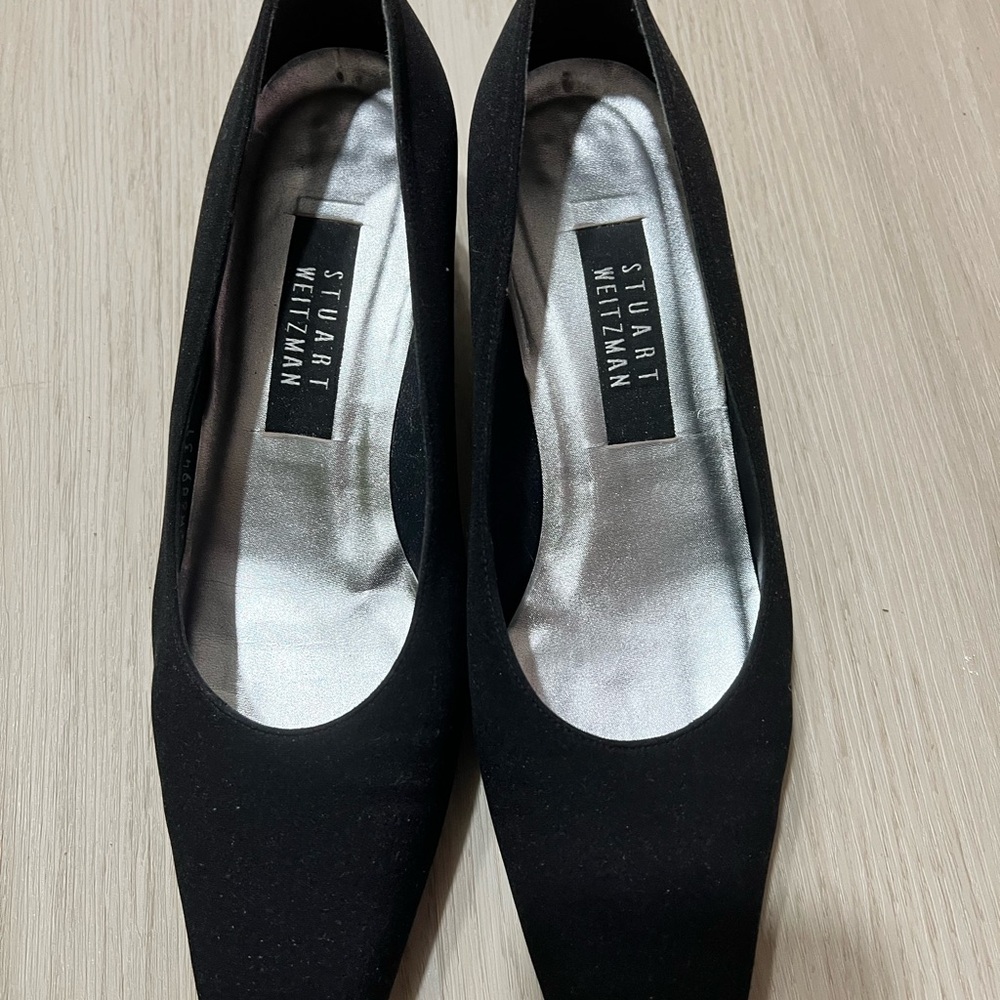 Stuart Weitzman Black Flats Sleek and Timeless Design